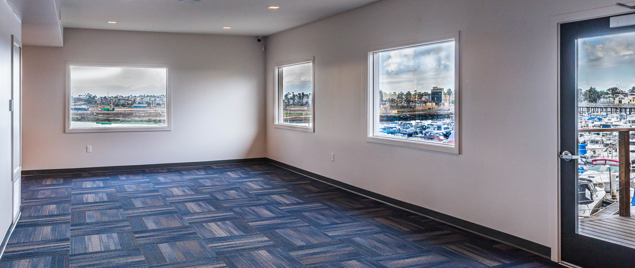 Partial view of community room and outdoor deck